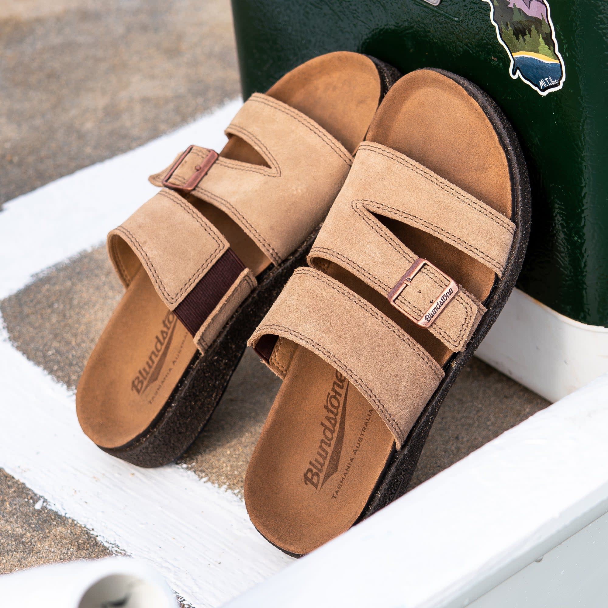 The Blundstone Aerocork sandal in sand suede — chunky, double-strapped, unapologetically Blundstone.